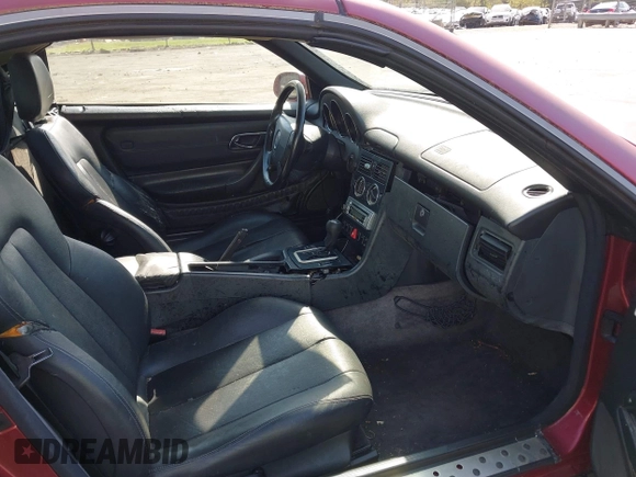 1999 Mercedes-Benz SLK-Class with VIN WDBKK47F0XF088123, listed as a IAAI auction lot 41991751 with 275,370 mi miles. Bid and sale history available at carsss.com. Image 5.