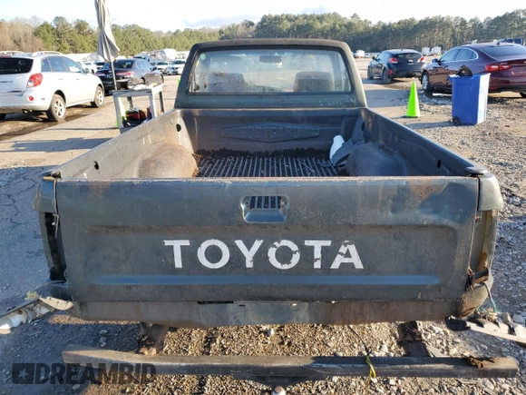1993 Toyota Pickup z VIN 4TARN81A6PZ114634, wystawiony jako Copart lot #53115865 z przebiegiem 161 536 mil mil oraz Szkoda całkowita • Salvage title. Historia ofert i sprzedaży dostępna na DreamBid. Obrazek 6.