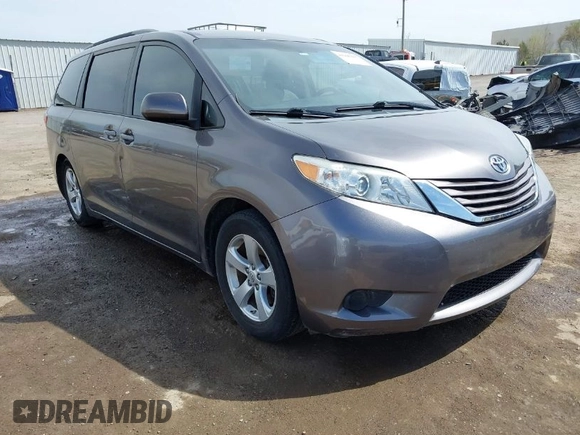 2015 Toyota Sienna LE AAS with VIN 5TDKK3DC5FS575077, listed as a IAAI auction lot 41941483 with 134,265 mi miles. Bid and sale history available at carsss.com. Image 1.