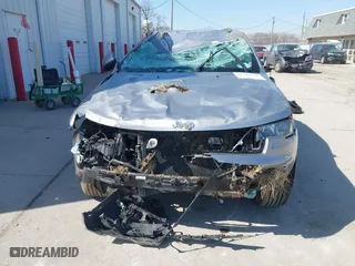 2018 Jeep Grand Cherokee Laredo E with VIN 1C4RJFAG8JC130465, listed as a IAAI auction lot 41789688 with 133,299 mi miles. Bid and sale history available at carsss.com. Image 13.