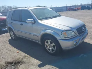 2003 Mercedes-Benz M-Class 3.2L with VIN 4JGAB54E23A383144, listed as a IAAI auction lot 41782124 with 148,084 mi miles. Bid and sale history available at carsss.com. Image 1.