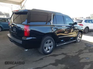 2016 Chevrolet Tahoe LT with VIN 1GNSKBKC5GR481043, listed as a IAAI auction lot 41968681 with 156,172 mi miles and . Bid and sale history available at DreamBid. Image 4.