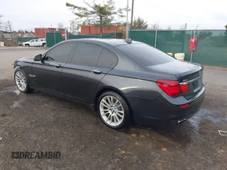 2015 BMW 7 Series 750i xDrive with VIN WBAYB6C56FG299238, listed as a IAAI auction lot 41441393 with 62,396 mi miles. Bid and sale history available at carsss.com. Image 3.