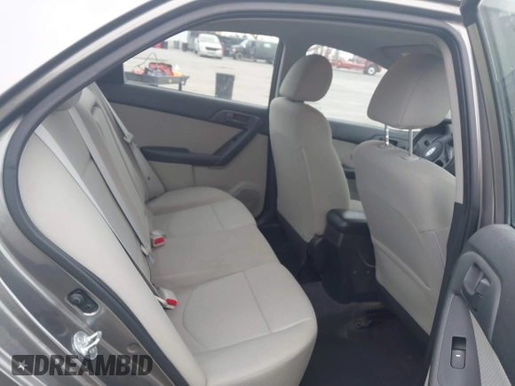 2011 Kia Forte EX with VIN KNAFU4A25B5441194, listed as a IAAI auction lot 42076839 with 91,706 mi miles. Bid and sale history available at carsss.com. Image 8.