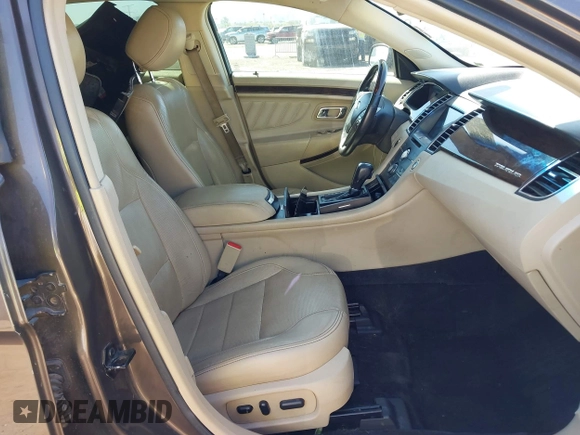 2016 Ford Taurus Limited with VIN 1FAHP2F83GG102584, listed as a IAAI auction lot 42029303 with 150,353 mi miles and . Bid and sale history available at DreamBid. Image 5.