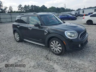 2017 MINI Countryman Cooper S with VIN WMZYT5C36H3D78964, listed as a Copart auction lot 59536135 with 129,258 mi miles and Salvage title. Bid and sale history available at DreamBid. Image 4.