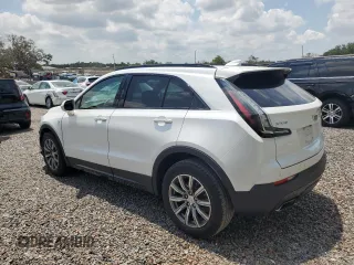 2019 Cadillac XT4 FWD Sport z VIN 1GYFZER47KF187301, wystawiony jako Copart lot #57715115 z przebiegiem 64 246 mil mil oraz Szkody całkowita. Historia ofert i sprzedaży dostępna na DreamBid. Obrazek 2.