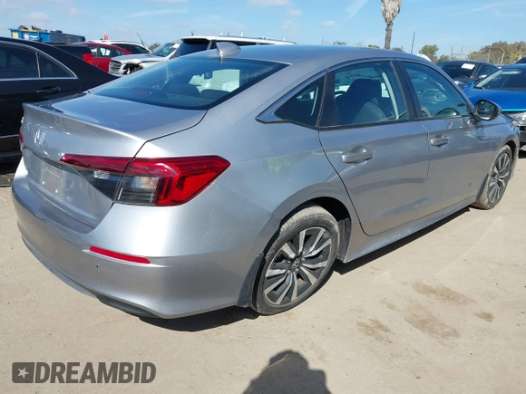2022 Honda Civic Sedan EX with VIN 2HGFE1F79NH327295, listed as a IAAI auction lot 41718620 with 26,624 mi miles. Bid and sale history available at carsss.com. Image 4.