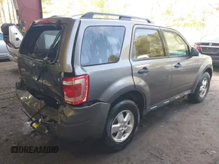 2010 Ford Escape XLT with VIN 1FMCU9D70AKD21499, listed as a IAAI auction lot 42039437 with 185,545 mi miles. Bid and sale history available at carsss.com. Image 4.