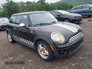 2009 MINI Hardtop with VIN WMWMF33539TW76329, listed as a IAAI auction lot 42512079 with 94,865 mi miles and . Bid and sale history available at DreamBid. Image 1.