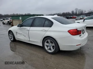 2015 BMW 3 Series 320i xDrive with VIN WBA3C3C5XFK202965, listed as a Copart auction lot 52422275 with 119,713 mi miles and Salvage title. Bid and sale history available at DreamBid. Image 2.