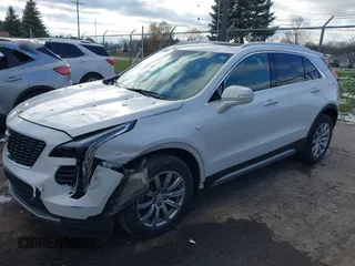 2022 Cadillac XT4 AWD Premium Luxury with VIN 1GYFZDR49NF105003, listed as a IAAI auction lot 41009382 with 43,395 mi miles and . Bid and sale history available at carsss.com. Image 2.