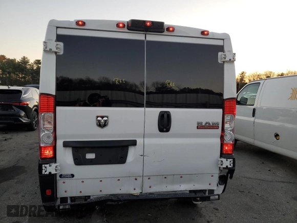 2021 Ram ProMaster Cargo with VIN 3C6LRVVG6ME554234, listed as a Copart auction lot 84409504 with 74,692 mi miles and Salvage Title. Bid and sale history available at DreamBid. Image 6.