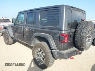 2025 Jeep Wrangler Rubicon with VIN 1C4PJXFNXSW532895, listed as a IAAI auction lot 42694548 with 1,886 mi miles and . Bid and sale history available at DreamBid. Image 3.