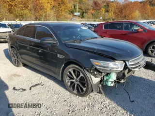 2015 Ford Taurus SEL z VIN 1FAHP2E85FG151155, wystawiony jako Copart lot #77791634 z przebiegiem 224 144 mil mil oraz Szkody całkowita. Historia ofert i sprzedaży dostępna na DreamBid. Obrazek 4.