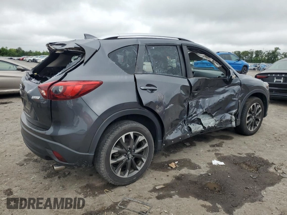 2016 Mazda CX-5 Grand Touring z VIN JM3KE4DY5G0741800, wystawiony jako Copart lot #58565455 z przebiegiem 33 675 mil mil oraz Szkoda całkowita • Salvage title. Historia ofert i sprzedaży dostępna na DreamBid. Obrazek 3.
