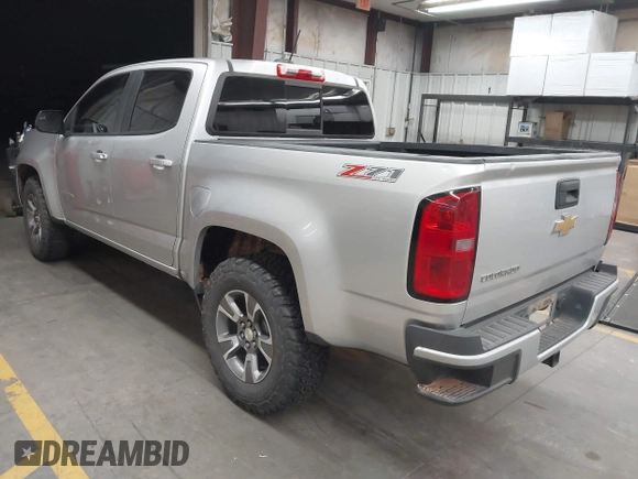2016 Chevrolet Colorado 4WD Z71 with VIN 1GCGTDE35G1214521, listed as a IAAI auction lot 41940159 with 103,565 mi miles. Bid and sale history available at carsss.com. Image 3.