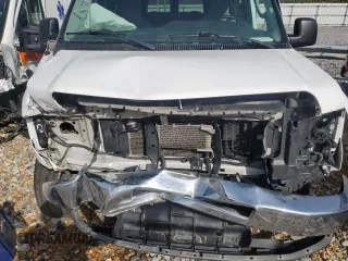 2012 Ford Econoline Passenger XL with VIN 1FBNE3BL9CDA99855, listed as a Copart auction lot 42314435 with 145,541 mi miles and Salvage title. Bid and sale history available at DreamBid. Image 12.