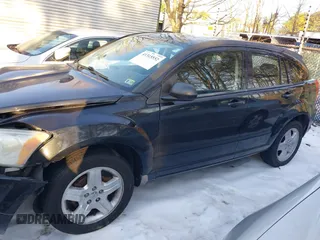 2009 Dodge Caliber SXT with VIN 1B3HB48A89D118869, listed as a IAAI auction lot 41315552 with 198,986 mi miles and . Bid and sale history available at DreamBid. Image 14.