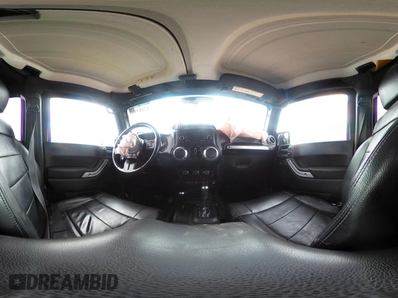 2012 Jeep Wrangler Unlimited Rubicon with VIN 1C4HJWFGXCL142804, listed as a IAAI auction lot 42183960 with 124,392 mi miles and . Bid and sale history available at DreamBid. Image 18.