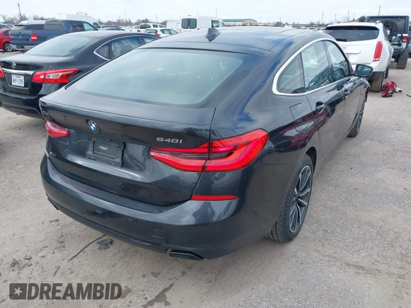 2019 BMW 6 Series 640i xDrive with VIN WBAJV6C50KBK08934, listed as a IAAI auction lot 41588796 with 61,411 mi miles and . Bid and sale history available at carsss.com. Image 4.