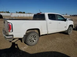 2018 GMC Canyon 4WD SLT with VIN 1GTP6DE13J1269627, listed as a Copart auction lot 73349774 with 191,385 mi miles and Salvage Title. Bid and sale history available at carsss.com. Image 3.