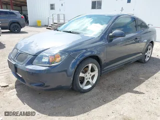 2009 Pontiac G5 GT with VIN 1G2AT18H797147694, listed as a IAAI auction lot 41996093 with 164,747 mi miles. Bid and sale history available at carsss.com. Image 2.