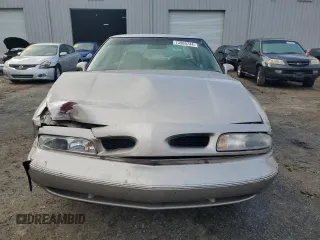 1997 Oldsmobile LSS z VIN 1G3HY52K9V4823565, wystawiony jako Copart lot #73965744 z przebiegiem 74 973 mil mil oraz Szkody całkowita. Historia ofert i sprzedaży dostępna na DreamBid. Obrazek 5.