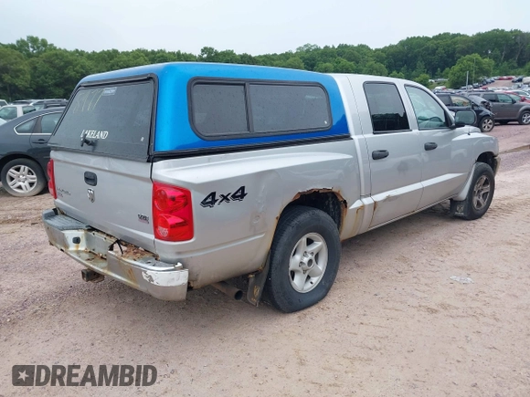 2005 Dodge Dakota SLT with VIN 1D7HW48N65S199887, listed as a IAAI auction lot 42508977 with 192,330 mi miles and . Bid and sale history available at DreamBid. Image 4.