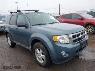 2010 Ford Escape XLT with VIN 1FMCU9DG7AKA92531, listed as a IAAI auction lot 42020546 with 134,158 mi miles. Bid and sale history available at carsss.com. Image 1.