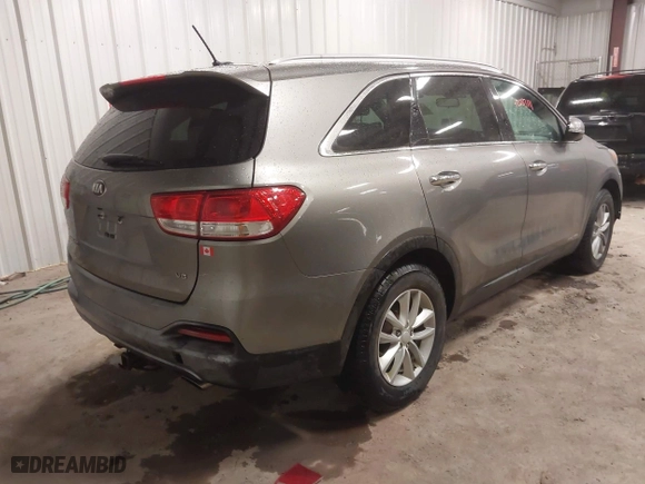2017 Kia Sorento LX V6 with VIN 5XYPGDA55HG217691, listed as a IAAI auction lot 42083111 with 124,444 mi miles. Bid and sale history available at carsss.com. Image 4.