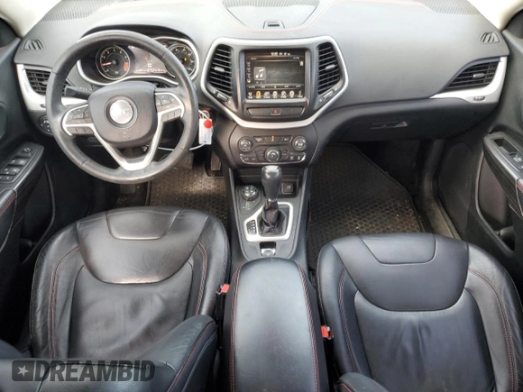 2014 Jeep Cherokee Trailhawk with VIN 1C4PJMBS9EW159993, listed as a Copart auction lot 46935105 with 128,140 mi miles and Salvage Title. Bid and sale history available at carsss.com. Image 8.
