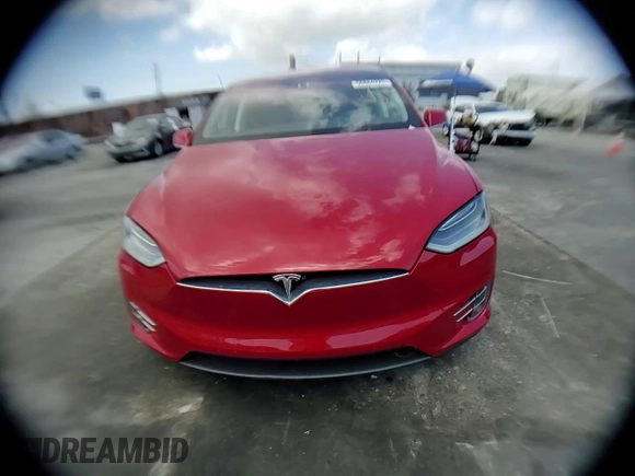 2016 Tesla Model X 70D with VIN 5YJXCAE28GF002399, listed as a Copart auction lot 50884225 with 73,113 mi miles and Salvage Title. Bid and sale history available at DreamBid. Image 11.