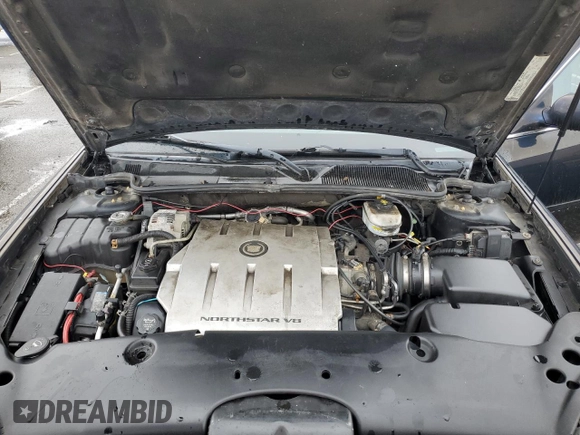 2005 Cadillac DeVille Limousine z VIN 1GEEH90Y05U550363, wystawiony jako Copart lot #55697945 z przebiegiem 47 196 mil mil oraz Czysty tytuł • Clean title. Historia ofert i sprzedaży dostępna na DreamBid. Obrazek 11.