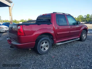 2004 Ford Explorer Sport Trac XLS with VIN 1FMZU67KX4UA61310, listed as a IAAI auction lot 41960362 with 113,889 mi miles. Bid and sale history available at carsss.com. Image 4.