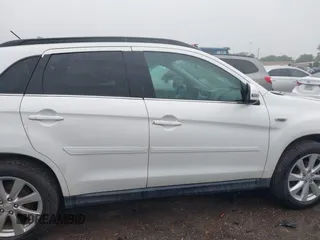 2015 Mitsubishi Outlander GT with VIN 4A4AR4AW5FE049655, listed as a IAAI auction lot 42352679 with 160,393 mi miles and . Bid and sale history available at DreamBid. Image 13.