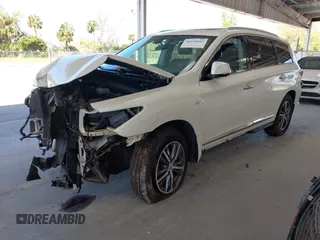 2020 Infiniti QX60 Luxe with VIN 5N1DL0MM9LC503000, listed as a IAAI auction lot 41650483 with 53,327 mi miles and . Bid and sale history available at DreamBid. Image 2.