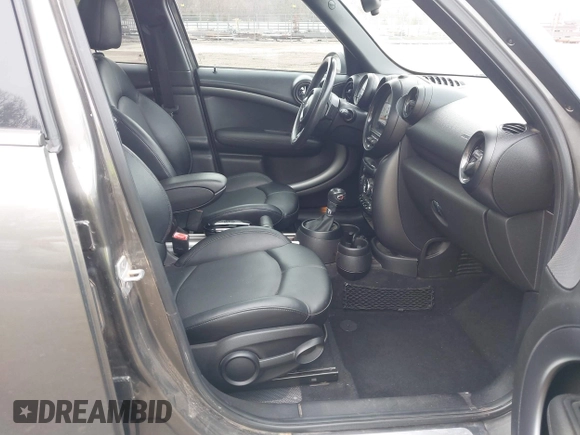 2014 MINI Countryman S with VIN WMWZC3C55EWT00349, listed as a IAAI auction lot 41738181 with 133,662 mi miles and . Bid and sale history available at DreamBid. Image 5.