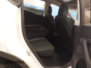 2023 Tesla Model Y Long Range with VIN 7SAYGDEE3PA206757, listed as a IAAI auction lot 39425483 with 5,711 mi miles and . Bid and sale history available at DreamBid. Image 8.