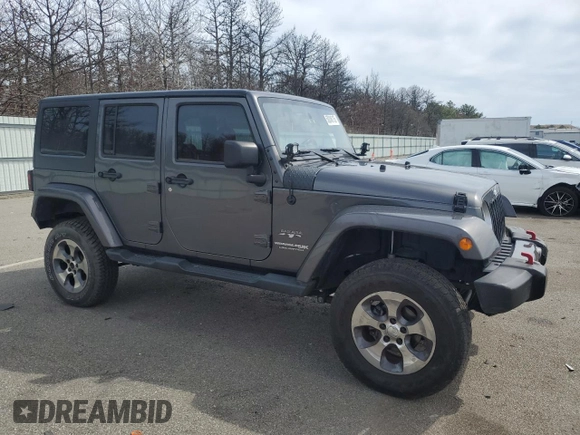 2018 Jeep Wrangler Unlimited Sahara with VIN 1C4BJWEG7JL856331, listed as a Copart auction lot 50246135 with 101,014 mi miles and Salvage title. Bid and sale history available at DreamBid. Image 4.