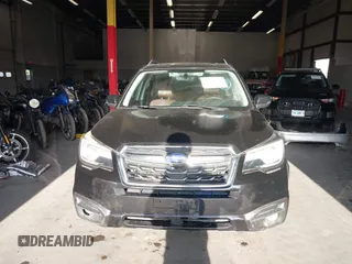 2017 Subaru Forester Touring z VIN JF2SJAWC8HH470269, wystawiony jako IAAI lot #41950347 z przebiegiem 135 189 mil mil oraz . Historia ofert i sprzedaży dostępna na DreamBid. Obrazek 13.