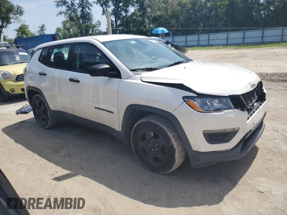 2018 Jeep Compass Sport with VIN 3C4NJCAB1JT193185, listed as a Copart auction lot 64463715 with 148,872 mi miles and Salvage title. Bid and sale history available at DreamBid. Image 4.