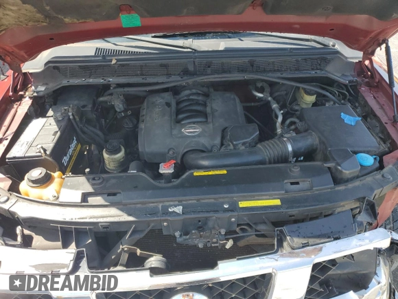 2004 Nissan Titan LE z VIN 1N6AA07B24N515239, wystawiony jako Copart lot #54713705 z przebiegiem 291 421 mil mil oraz Szkoda całkowita • Salvage title. Historia ofert i sprzedaży dostępna na DreamBid. Obrazek 11.