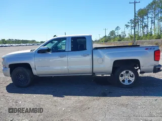 2018 Chevrolet Silverado 1500 LT with VIN 1GCVKREC9JZ335603, listed as a IAAI auction lot 41853399 with 152,460 mi miles and . Bid and sale history available at DreamBid. Image 14.