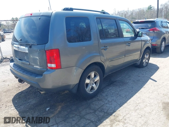 2009 Honda Pilot EX-L with VIN 5FNYF48649B018548, listed as a IAAI auction lot 42069029 with 198,098 mi miles and . Bid and sale history available at carsss.com. Image 4.