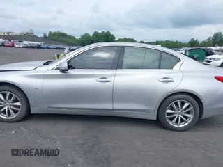 2015 Infiniti Q50 Sport with VIN JN1BV7AR1FM396590, listed as a IAAI auction lot 42687130 with 104,265 mi miles and . Bid and sale history available at DreamBid. Image 14.