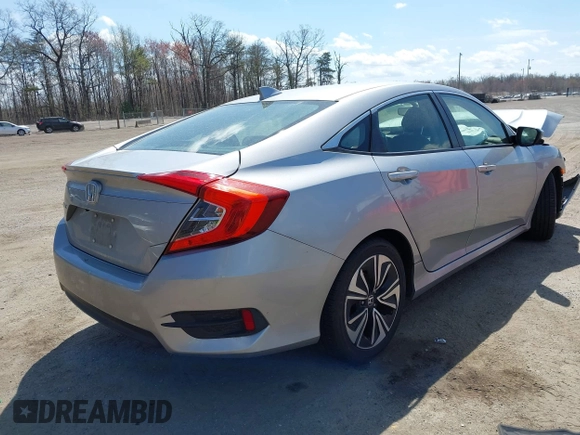 2018 Honda Civic EX-L with VIN JHMFC1F72JX043788, listed as a IAAI auction lot 41853131 with 137,266 mi miles and . Bid and sale history available at DreamBid. Image 4.