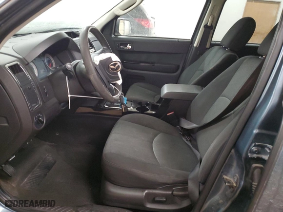 2010 Mazda Tribute Touring with VIN 4F2CY9C72AKM02952, listed as a Copart auction lot 84197854 with 0 mi miles and Salvage Title. Bid and sale history available at carsss.com. Image 7.