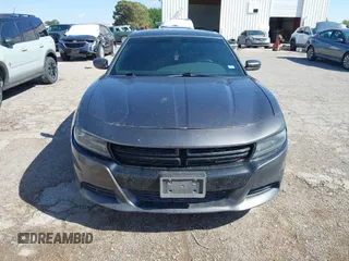 2015 Dodge Charger SXT with VIN 2C3CDXHG9FH825135, listed as a IAAI auction lot 42172793 with 169,324 mi miles and . Bid and sale history available at DreamBid. Image 12.