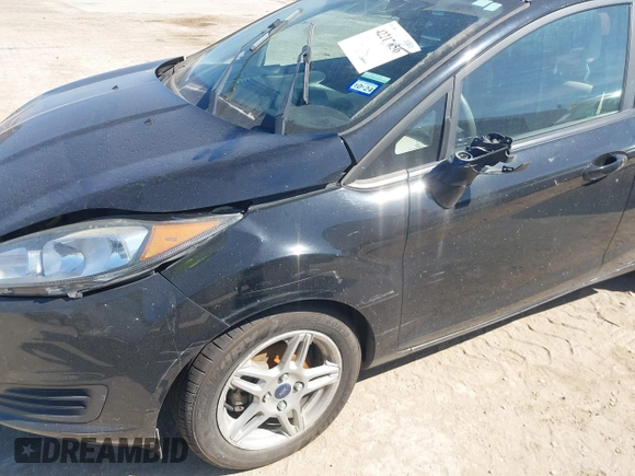 2018 Ford Fiesta SE with VIN 3FADP4EJ5JM106891, listed as a IAAI auction lot 42217656 with 116,547 mi miles and . Bid and sale history available at DreamBid. Image 12.